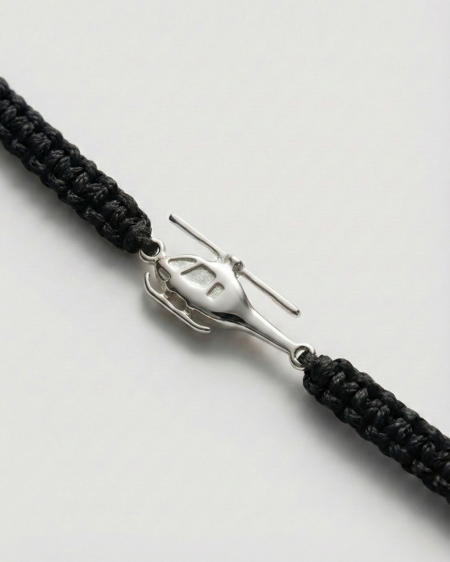 Helicopter bracelet on cord