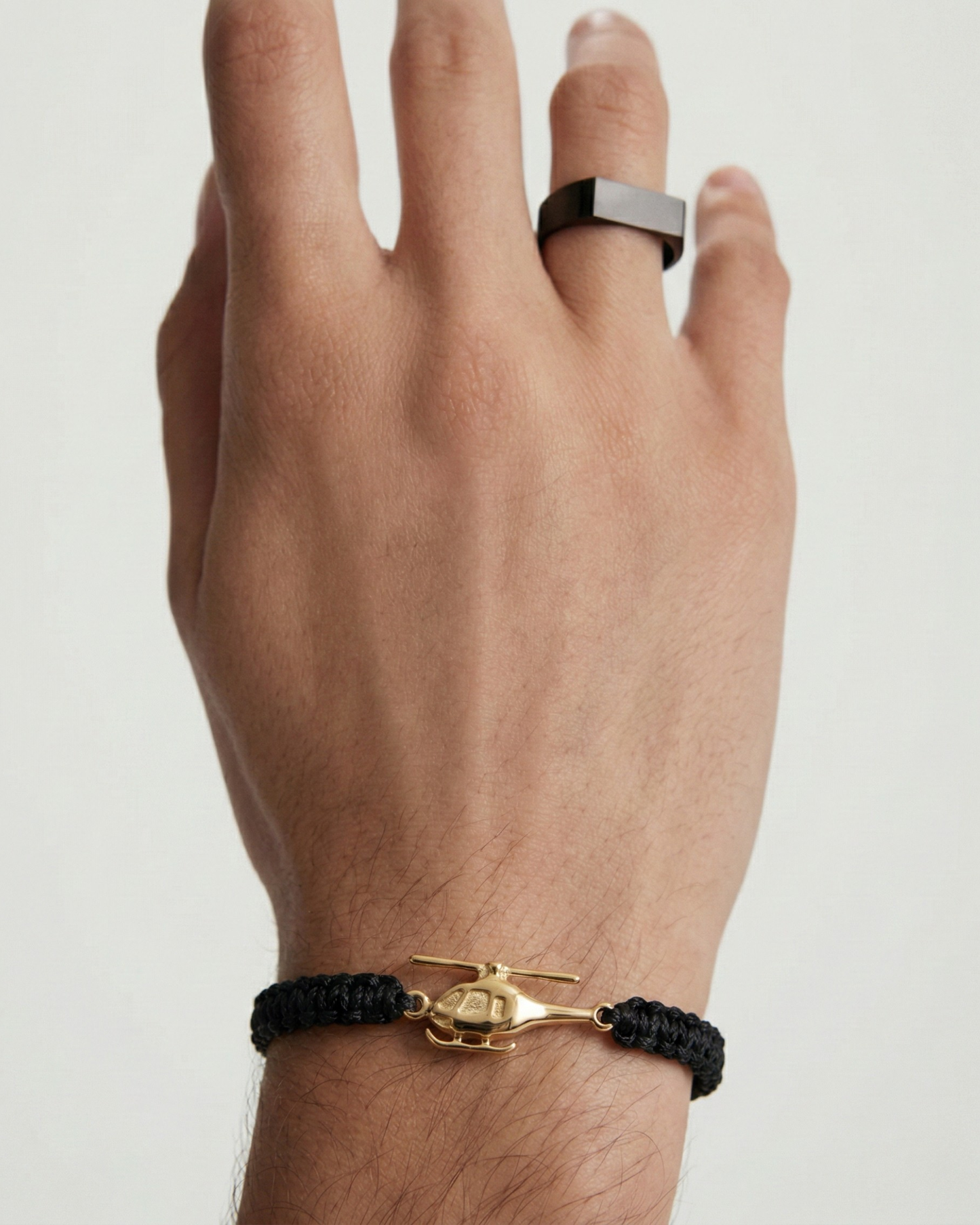 Helicopter bracelet on cord